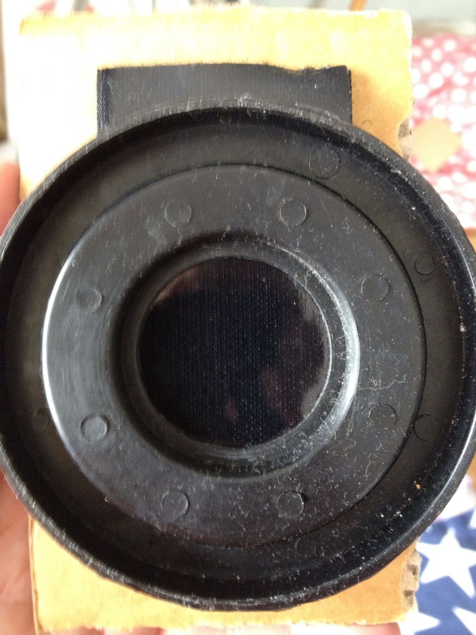 I took the cap off the telescope and used that plus my iPhone to see how large to cut my cardboard.