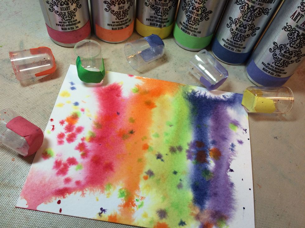 I took the spray nozzles out of the bottles and used the other end to tap on some dots of color across the card.