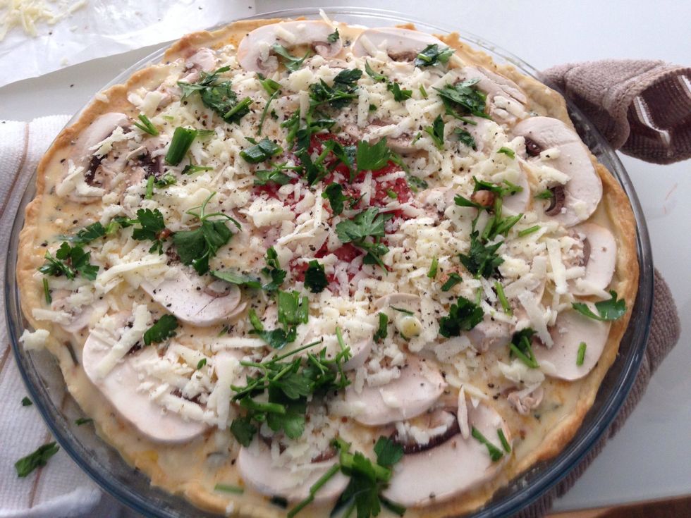 I topped with chopped mushrooms, sliced tomato, parsely and black pepper and extra cheese :) Place in the middle of the oven for 25 mins on 180c.