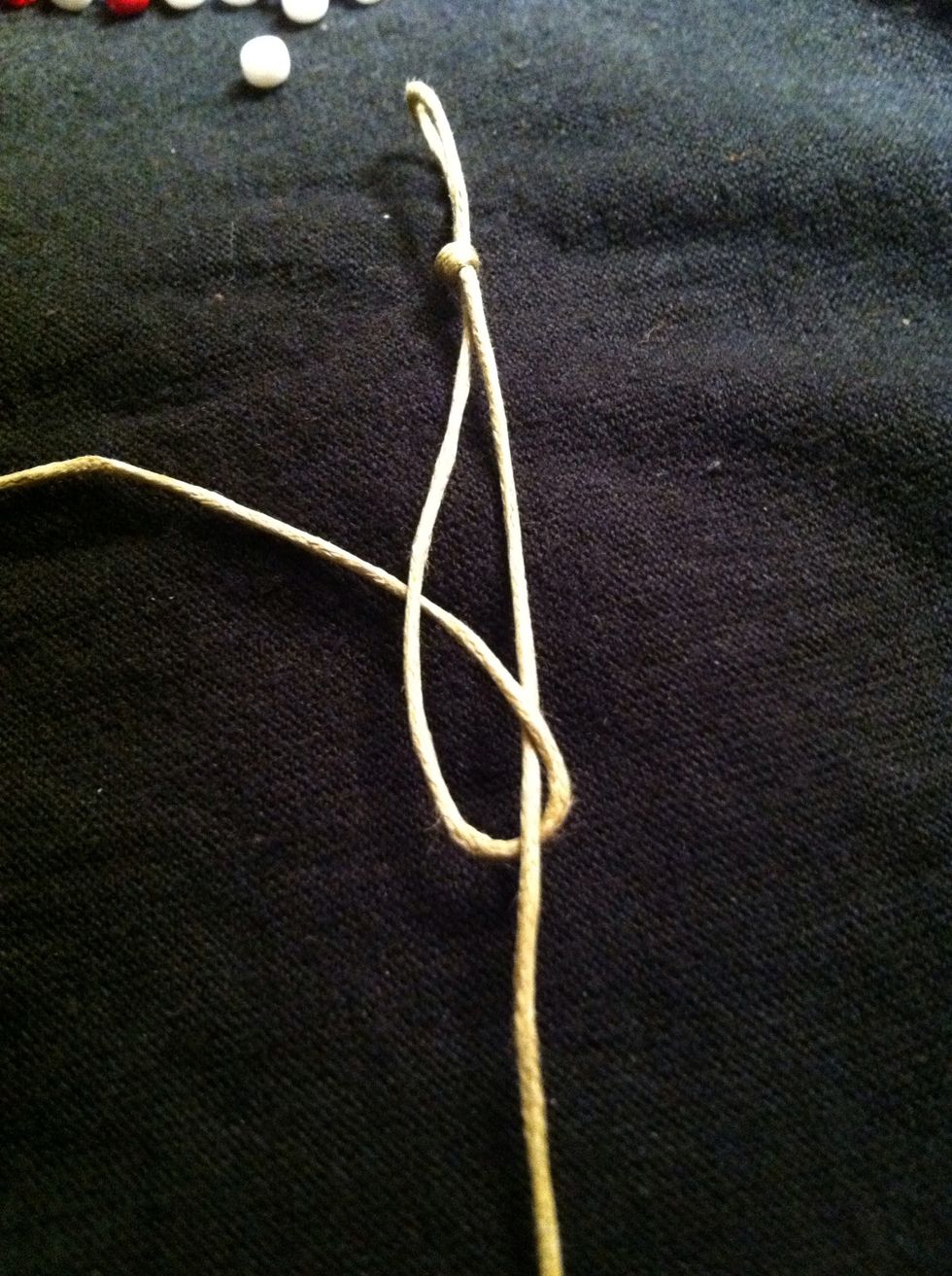 I tried to get a video but couldn't this is to show you the path of the left strand tying over the right.the idea is to tie the strands over each other alternating back and forth.
