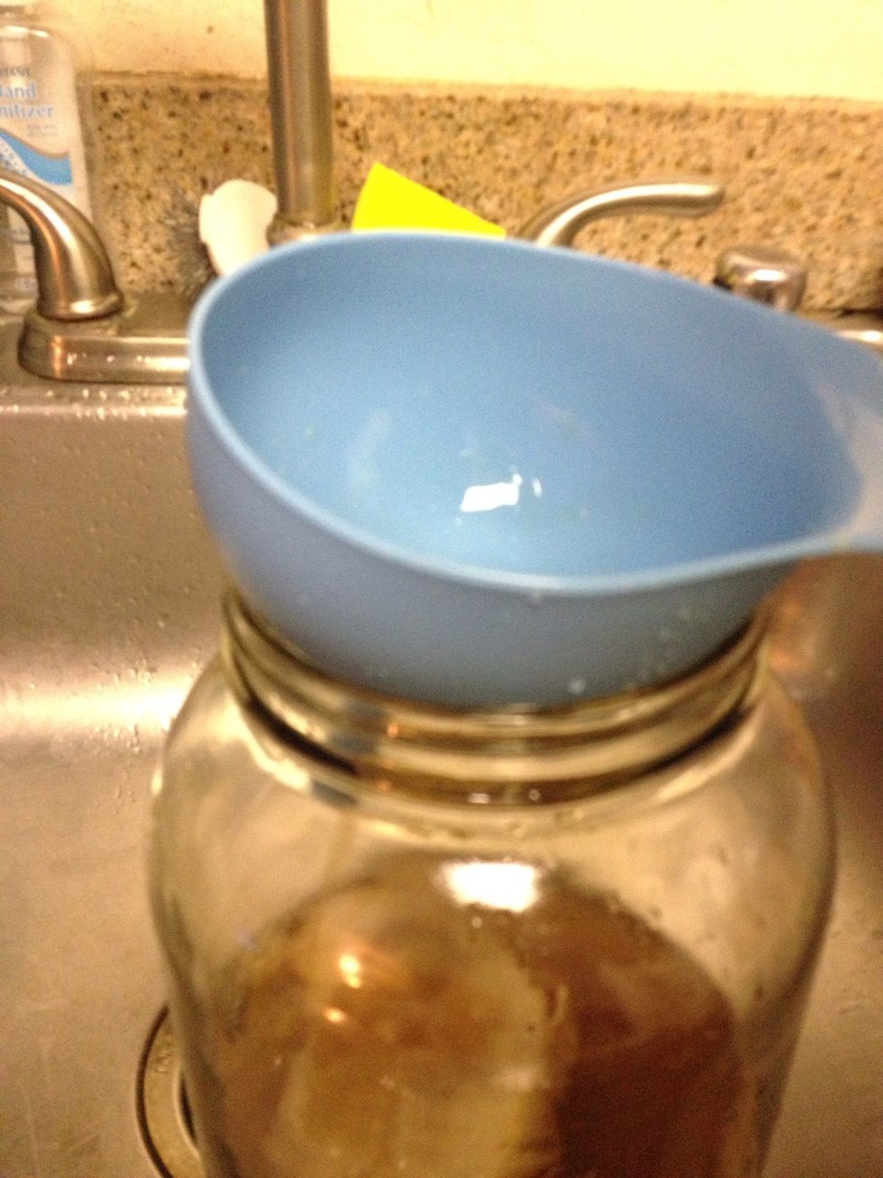 I use a funnel to aid in pouring the tea, I aim the funnel at the sidewall of the jar to prevent breaking up the SCOBY, its fragile, but will easily heal.