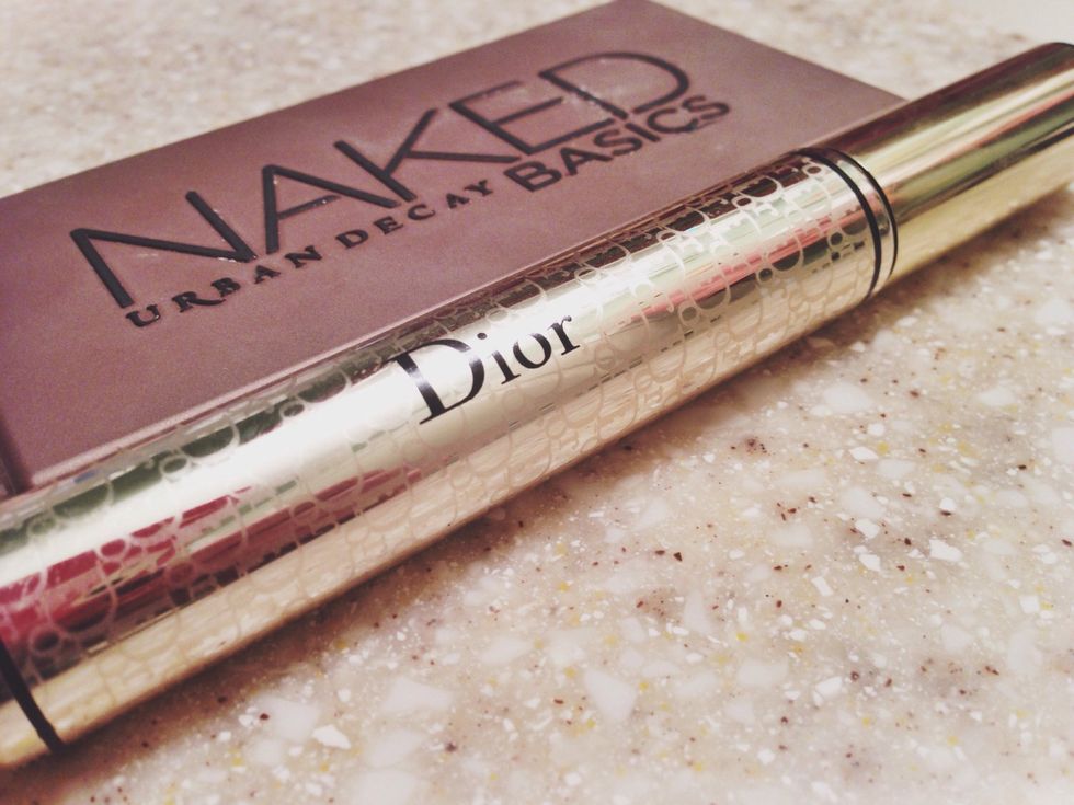 I use a high quality black brown mascara for a more natural look.