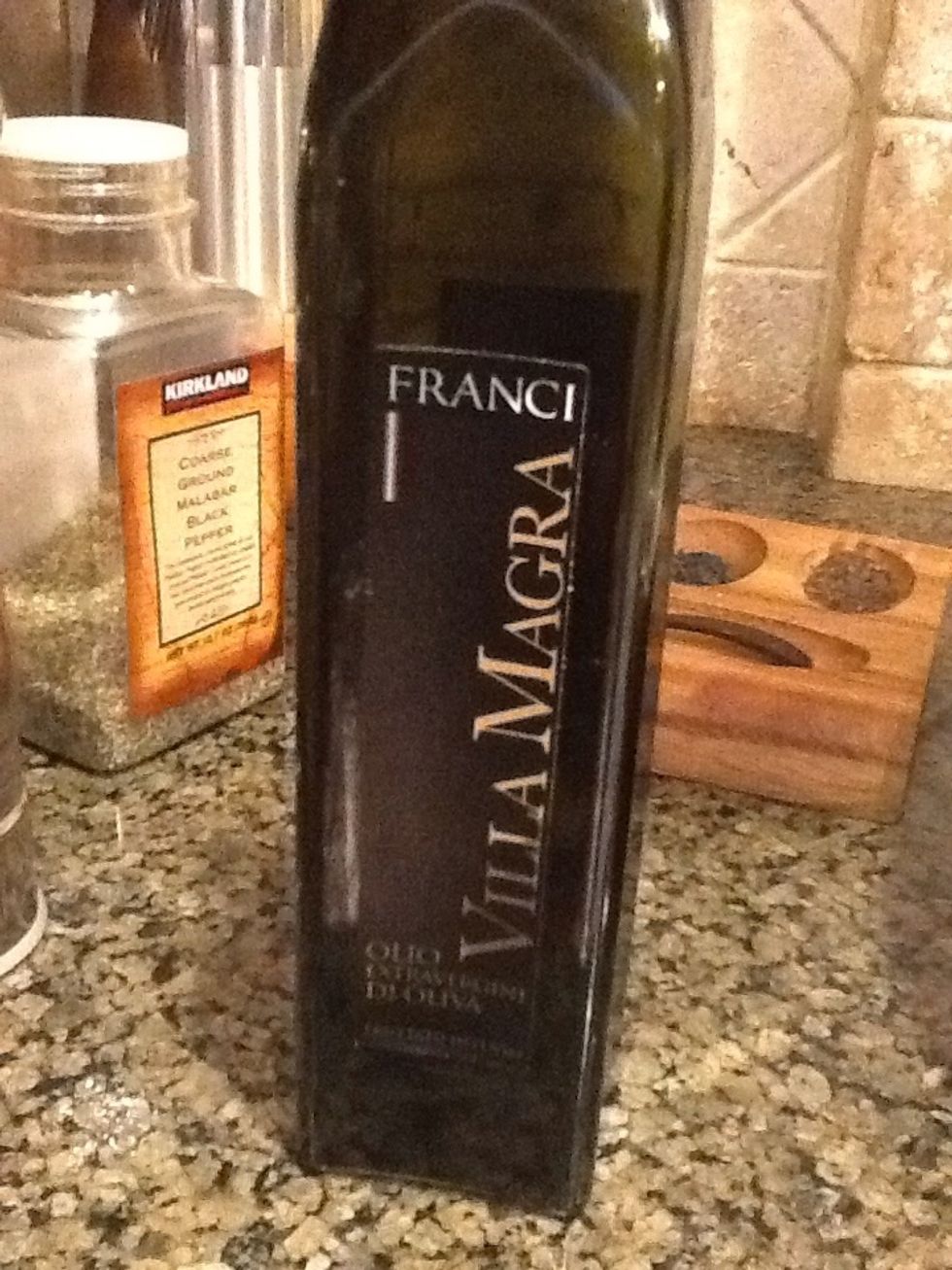 I use a little olive oil for flavor, I can't replace it with the butter beach use it burns faster and you might get a fire in the oven.