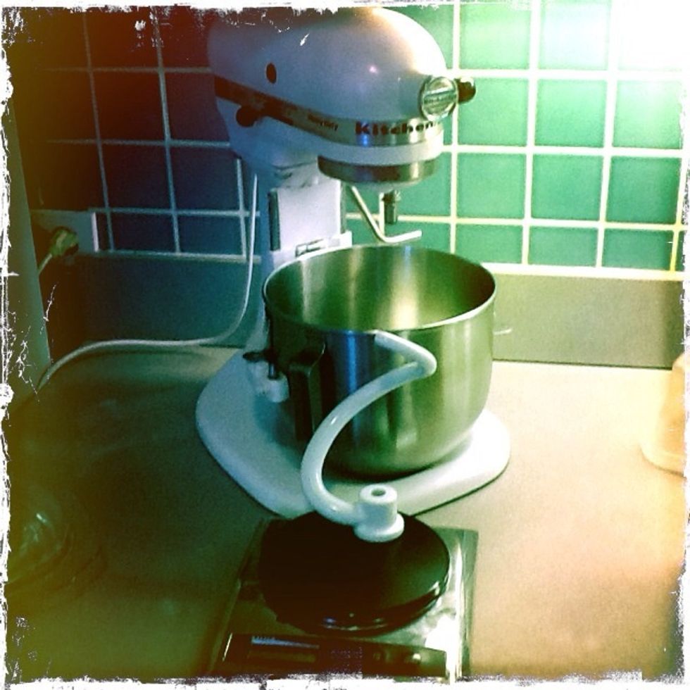 I use a mixer and hook but you can do it by hand. When baking bread it is good to always scale your ingredients.