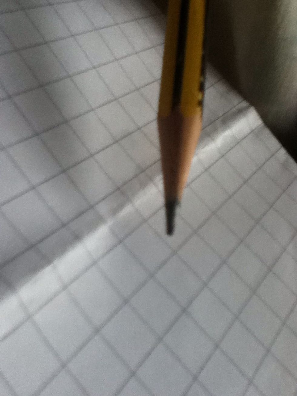 I use a pencil and paper to create the details.