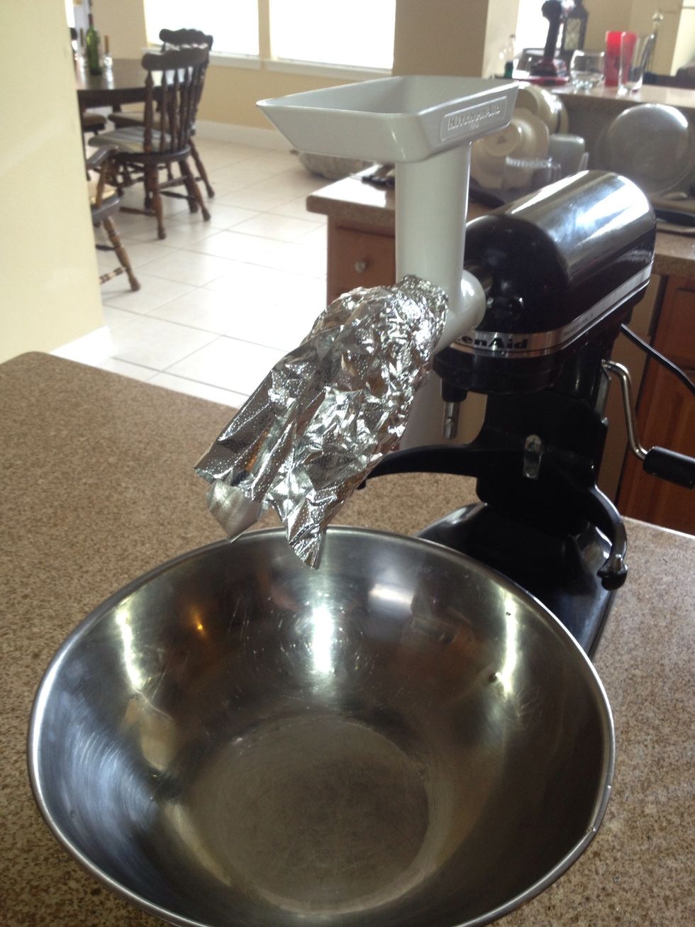 I use a piece of foil to keep the ground beef going in the bowl and not on me.