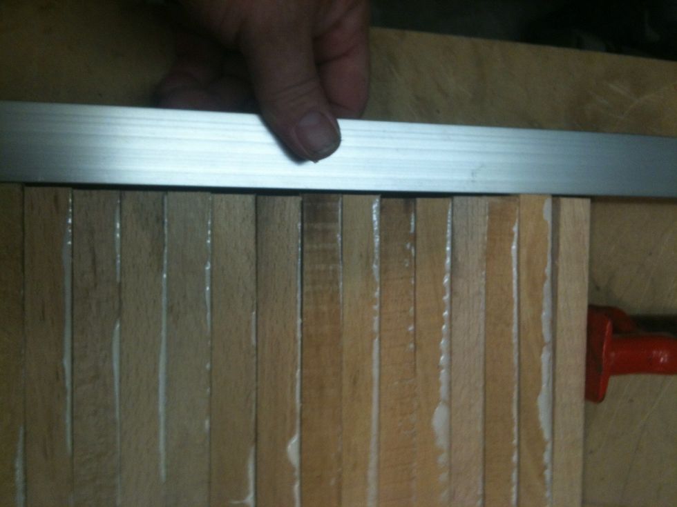 I use a straight edge to line up one end of the boards.