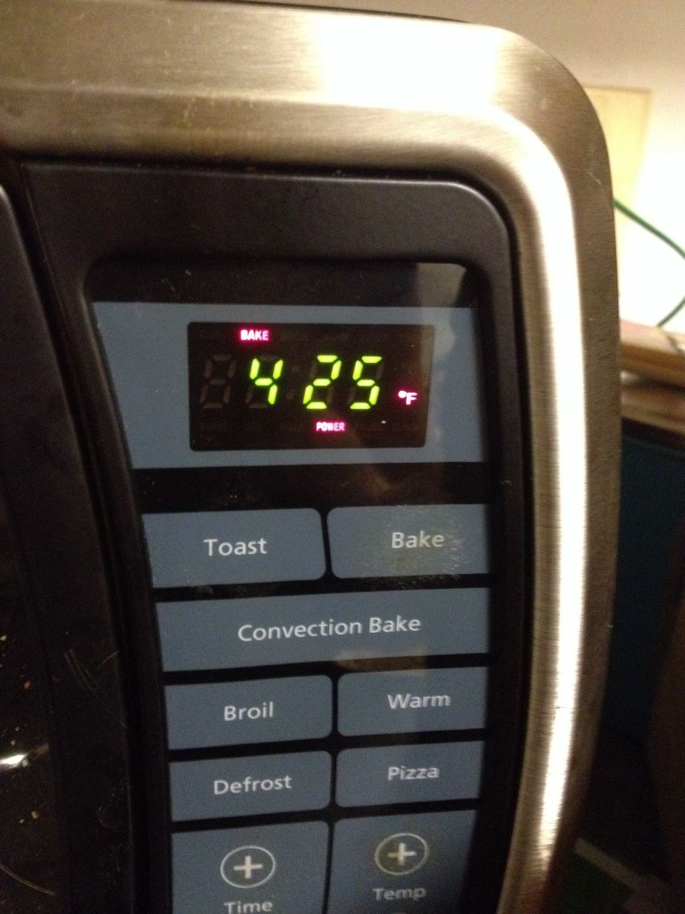 I use a toaster oven so no need to pre-heat, depending on your oven you may want to. 425 degrees. I bake for 8 minutes, this will vary a bit with your oven and the crust you're using.
