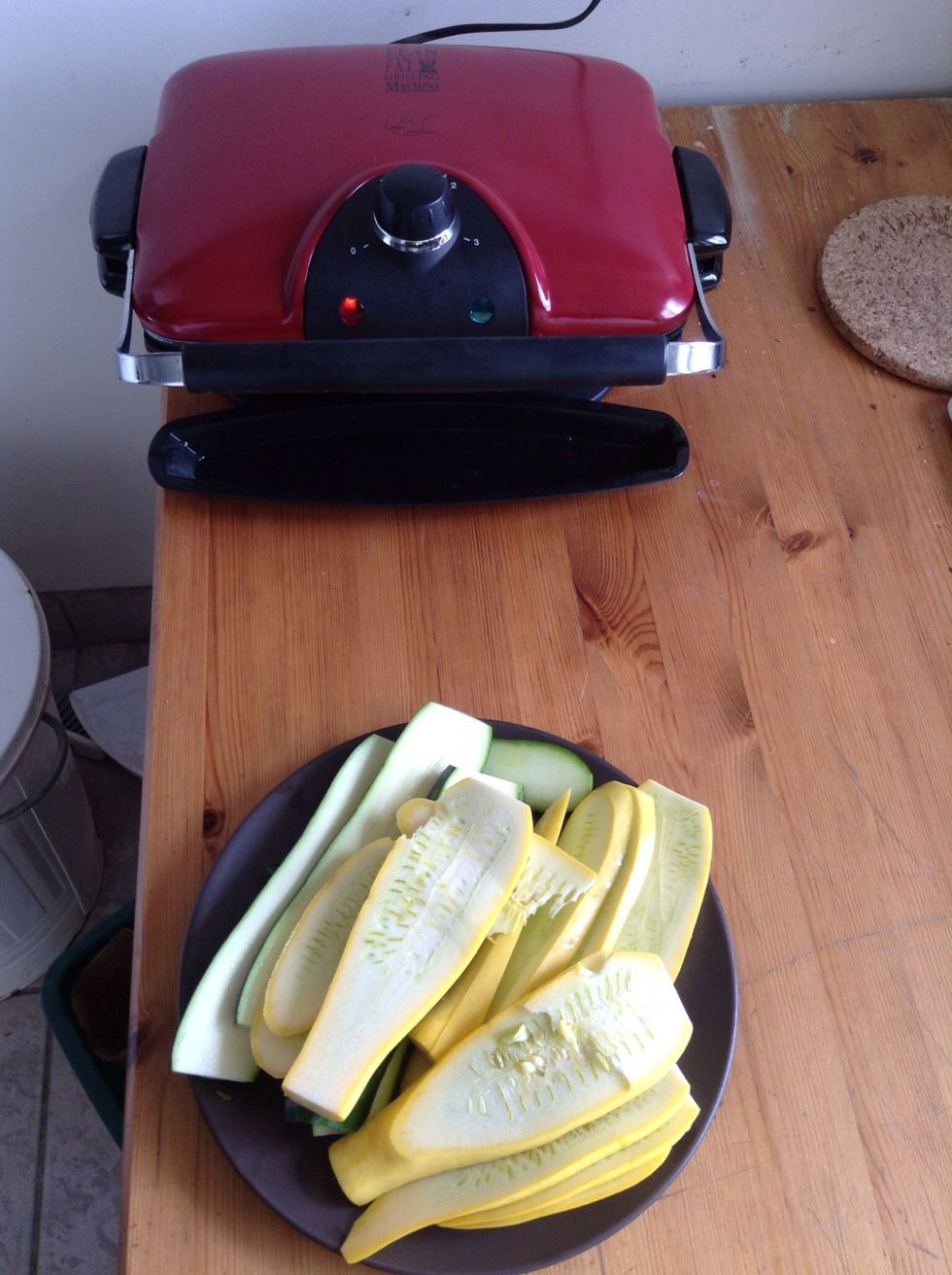 I use an electric grill, but you can use the oven too