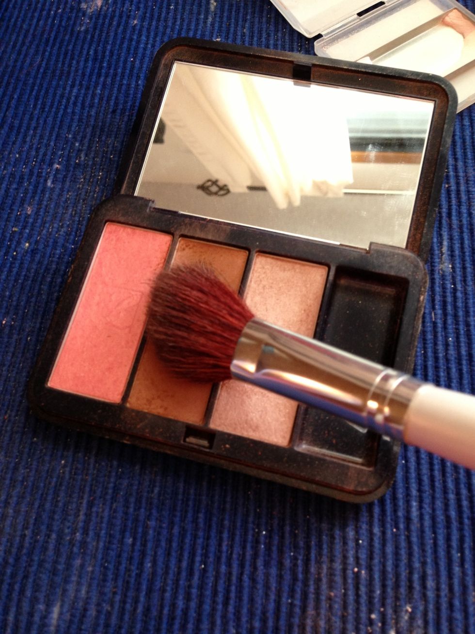 I use an even darker powder right where my contour starts to make it pop even more.