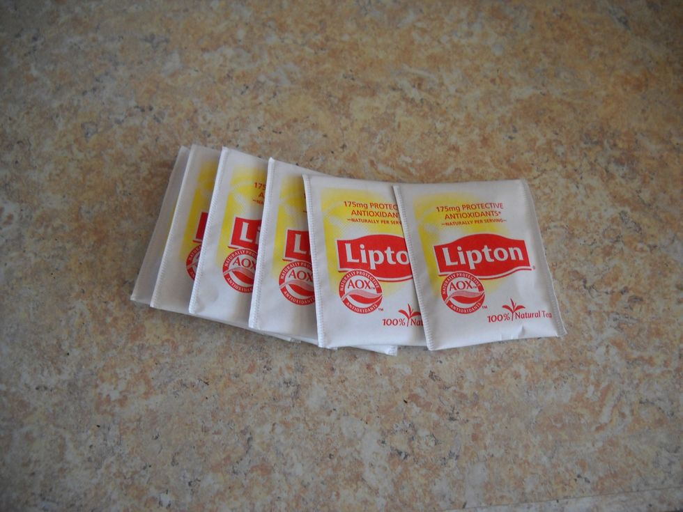 I use around six tea bags. If you like stronger tea, use more (eight or so). If you like weaker tea, less is good (maybe three or four bags).