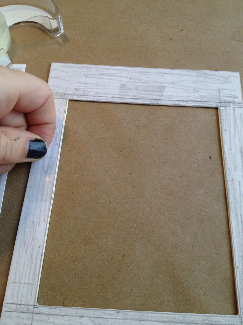 I use double sided tape on the back of the mat to attach the image.