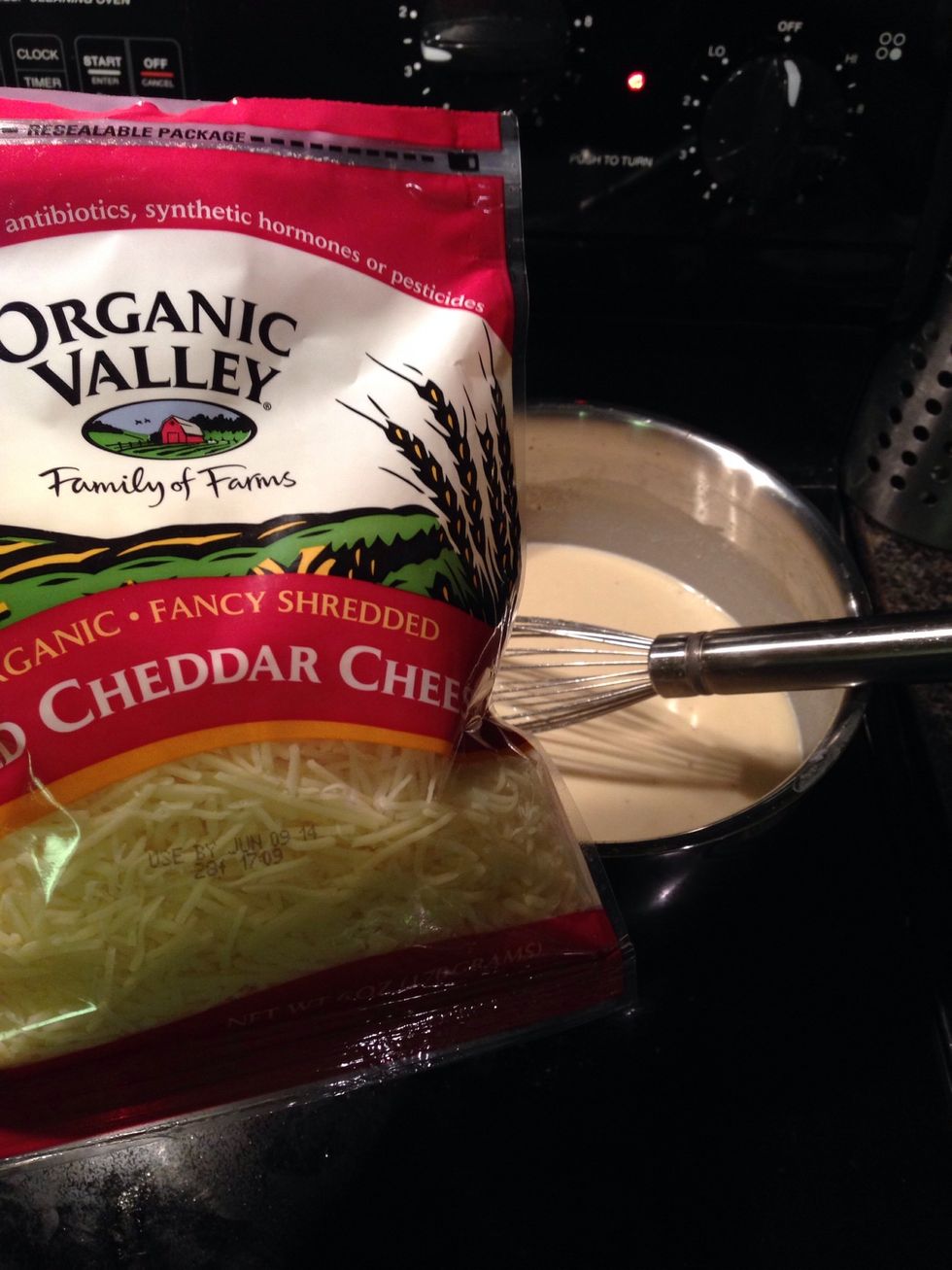 I use entire 6oz bag of organic shredded cheddar cheese.