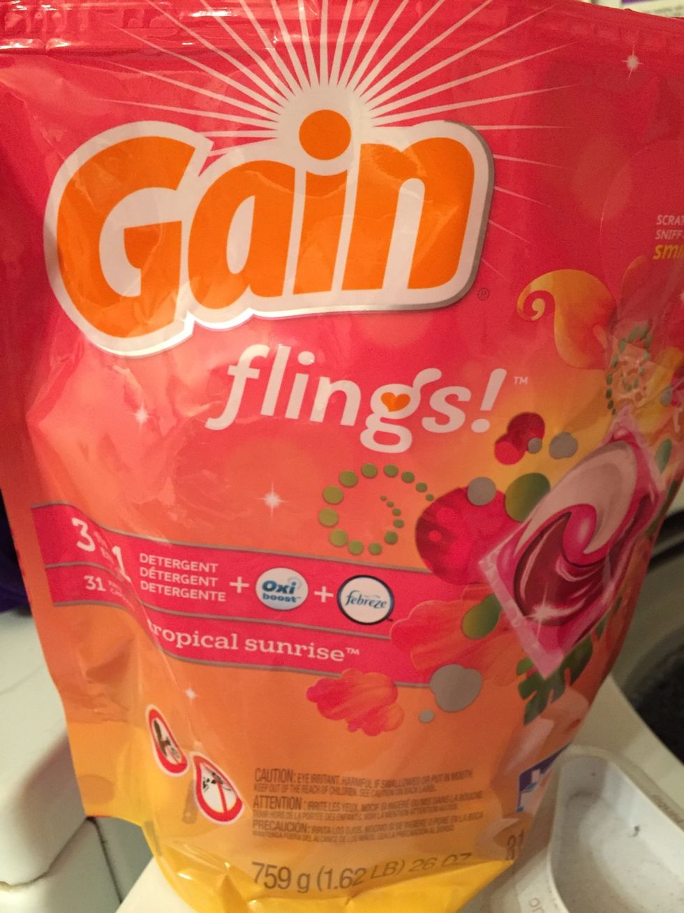 I use gain flings which has detergent and softener all in one.