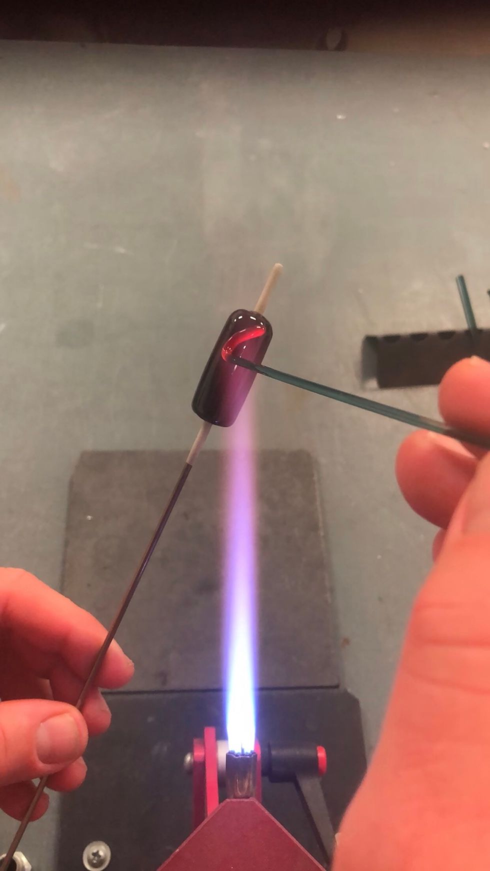 I use light pressure to guide the glass, giving it just enough push to flatten a bit as it\u2019s applied.