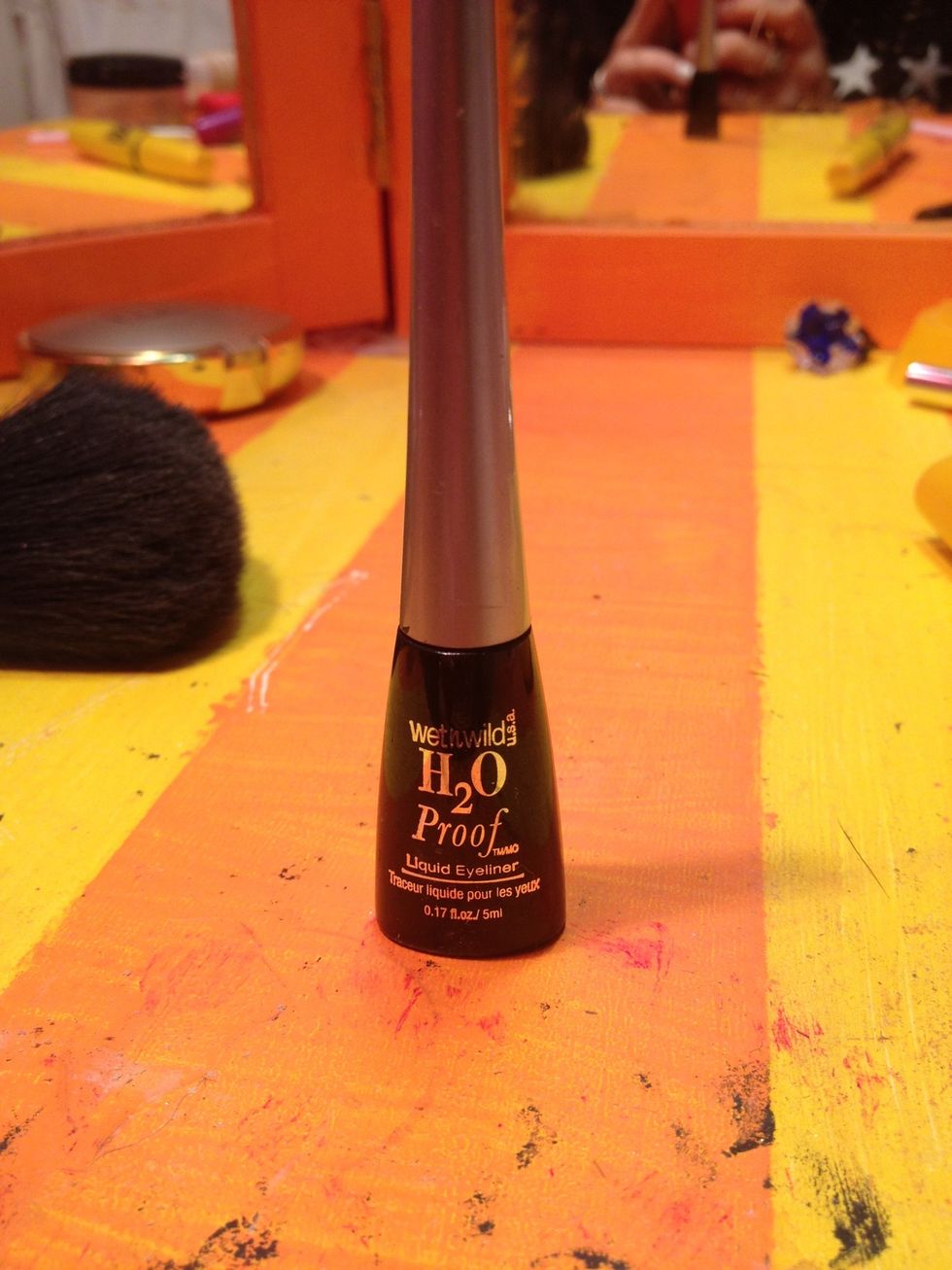 I use liquid eyeliner for the top. You can use whatever kind of liquid eyeliner.