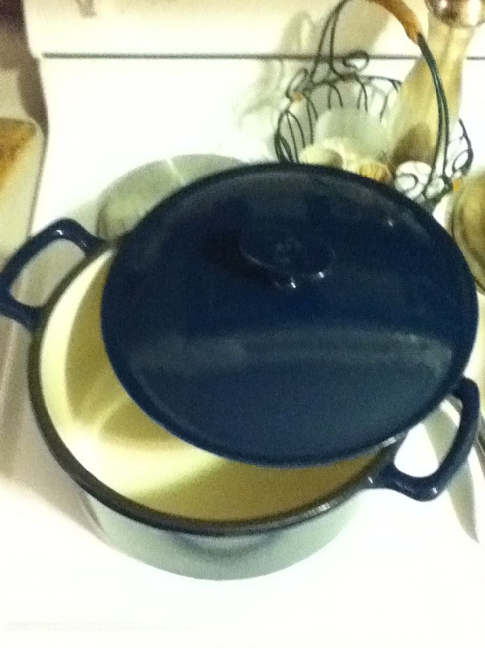 I use my giant enameled cast iron pot but you can use any large heavy pot with a tight fitting lid. If your pot is smaller than mine, you can use a couple Pyrex casseroles for the oven part.