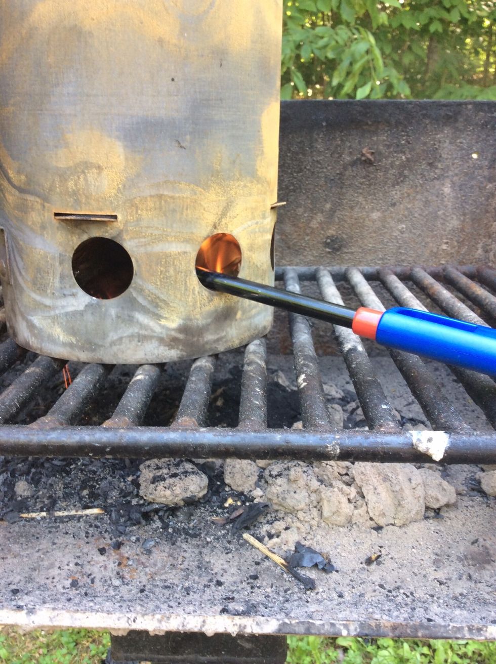 I use newspaper to light the charcoal. We don't like the smell or the taste lighter fluid when cooking with charcoal. You can use lighter fluid if you like.