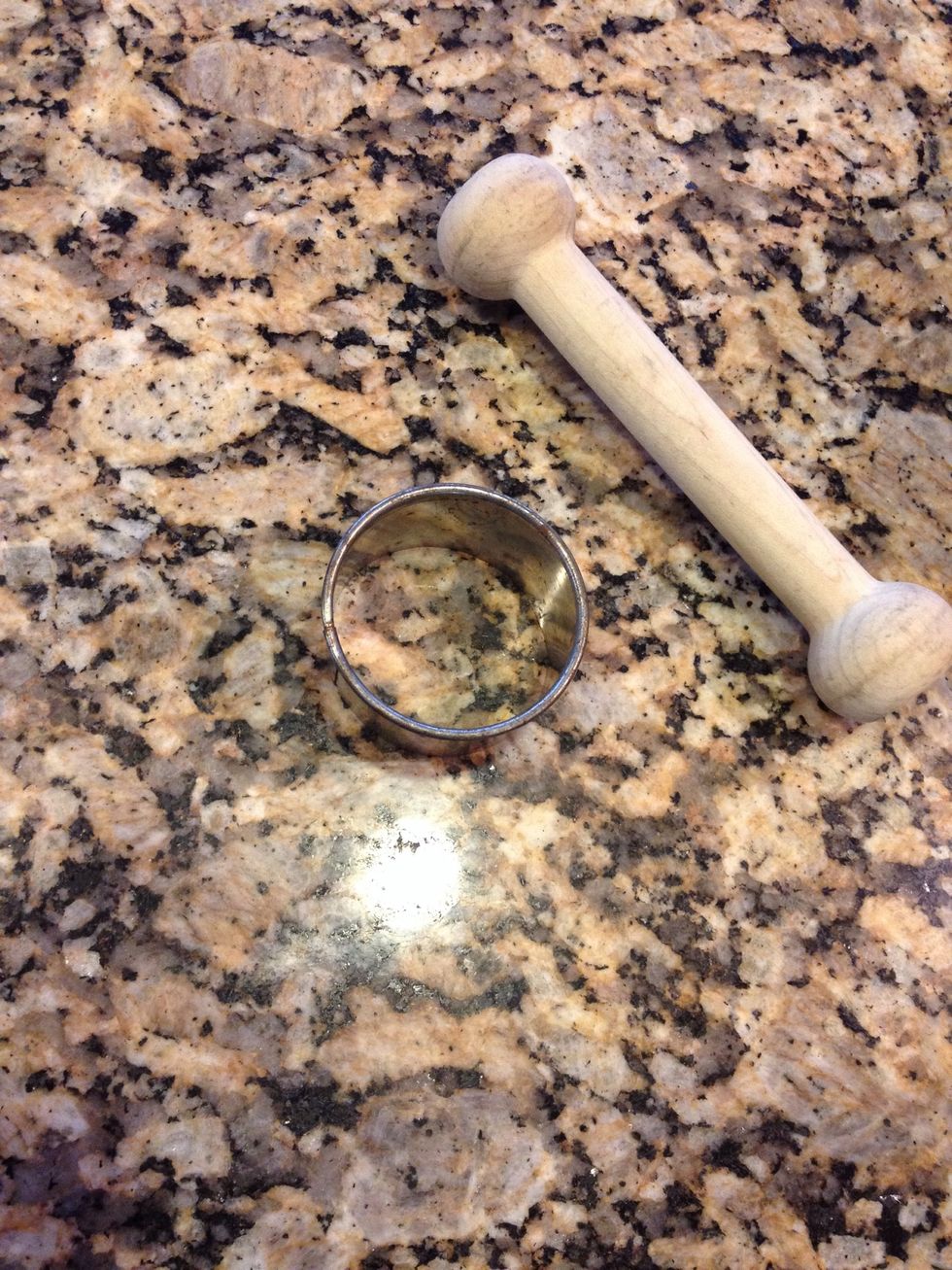 I use the next to smallest round from mine. Also you'll need a mini tart press