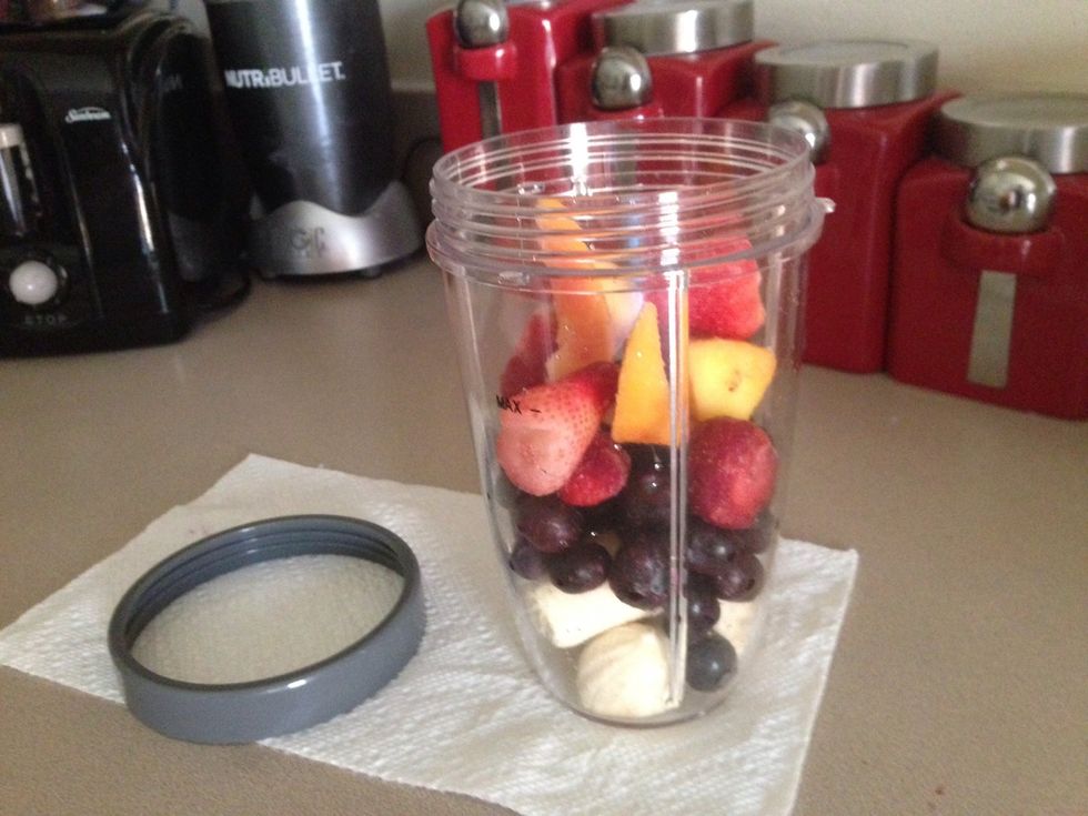 I use the Nutri-Bullet, this thing is awesome!! It will blend anything!!