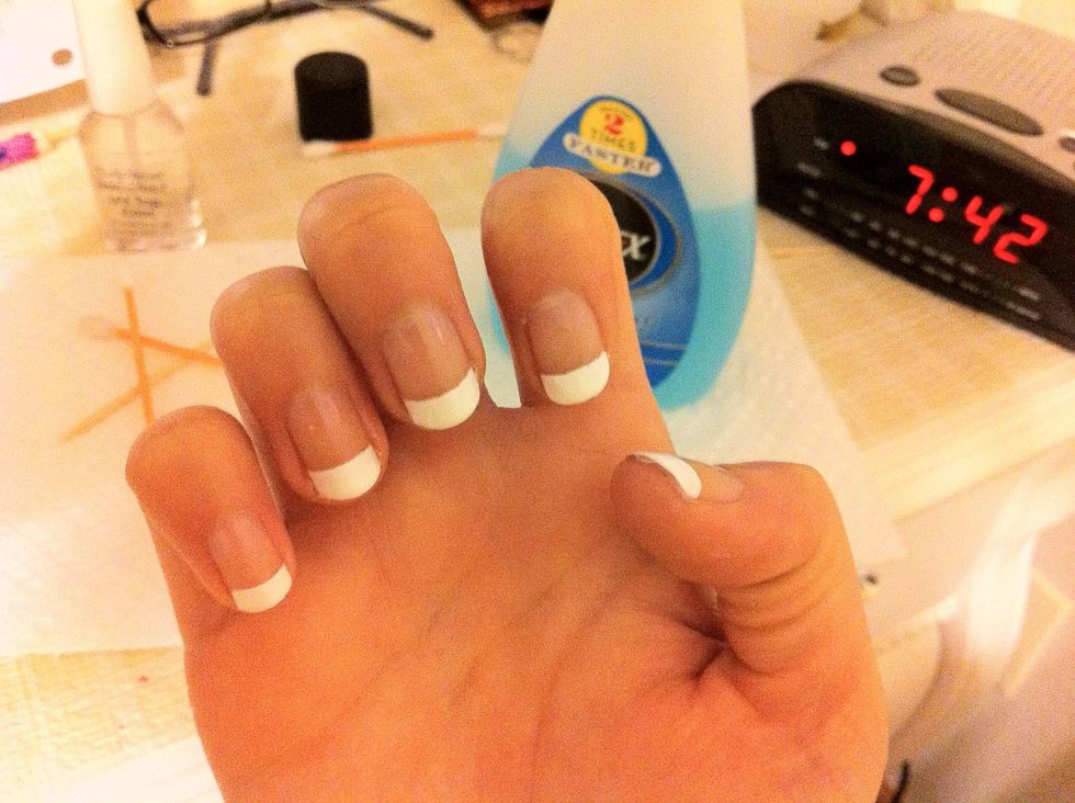 I use the toothpick to go between my nail and skin to remove any white residue and then I use a qtip and dip it in the nail remover and just remove the white polish and arch them.