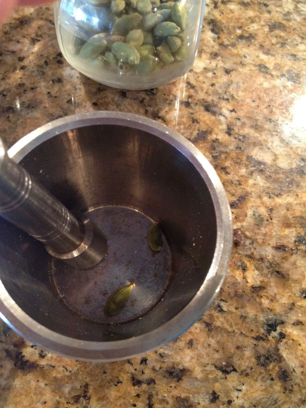 I use this to crush cardamon, but you break it it with a spoon as well.
