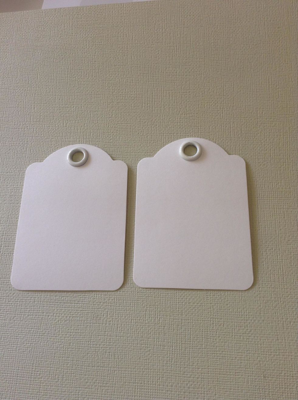 I used 2.5 in x 3.5 in Artist Trading Tags-Ivory, Graphic 45 Staples