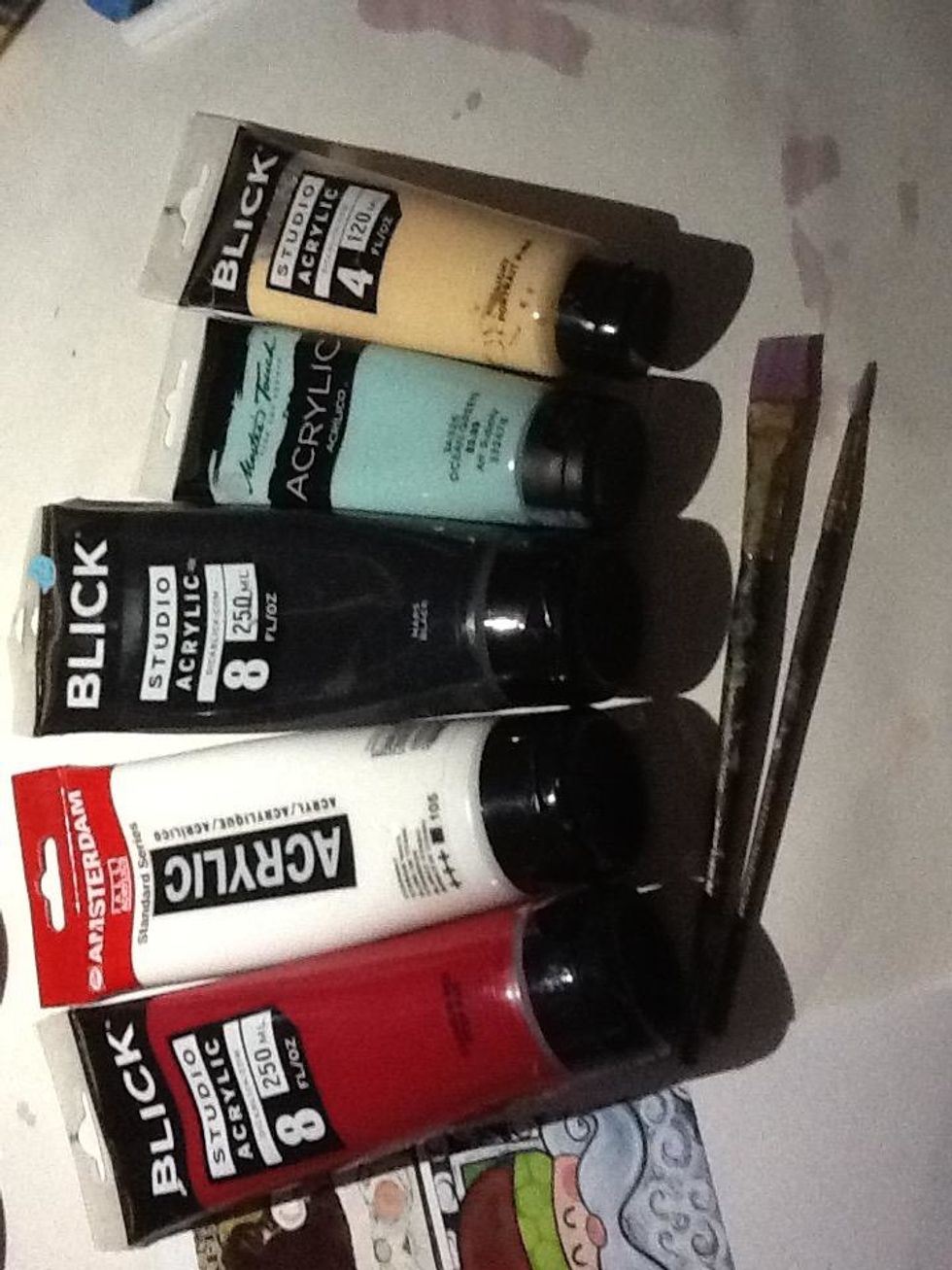 I used a 1/2 inch flat head paint brush and a small round tip brush. I used black, white, red, light blue, and portrait pink acrylic paint.