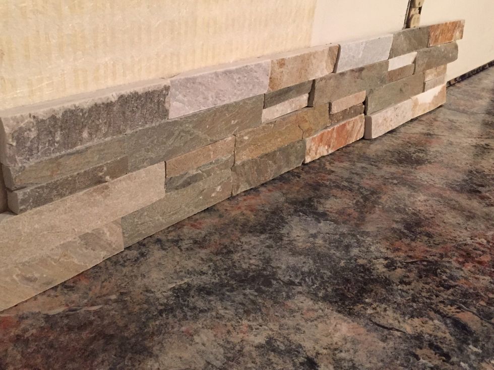 (I used a combo of an sticky mat with construction adhesive on the tiles that didn't make contact with the walls due to their irregular back). Natural stone is not uniform.