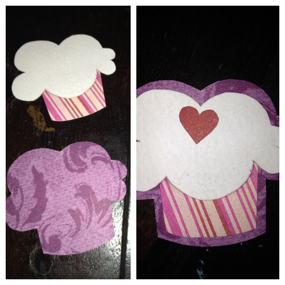 I used a different purple to back the cupcake. I traced the icing and cup a little bigger than the size of cupcake - cut and glued. add a heart for decoration! place under yearbook to set.