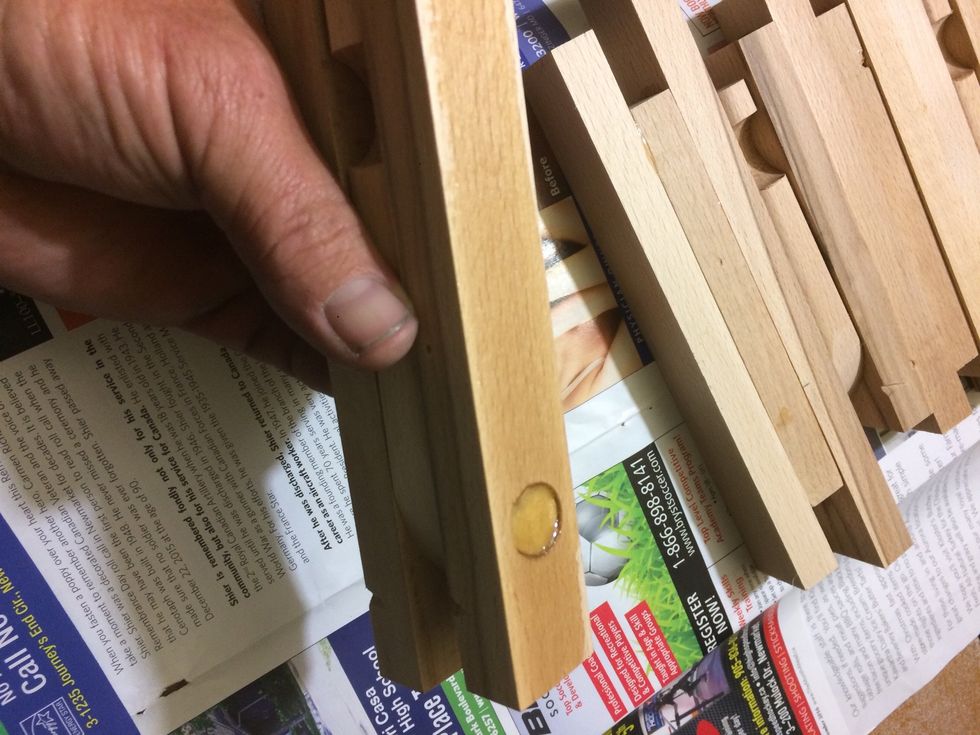 I used a disposable brush to apply the epoxy. Where the hook are I ended up putting epoxy around the dowel but none around the hook.( need it to move)