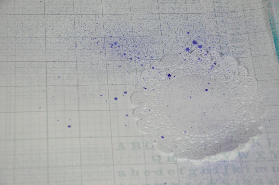 I used a doily as stencil and sprayed just enough to have some color. Don't throw away the doily!