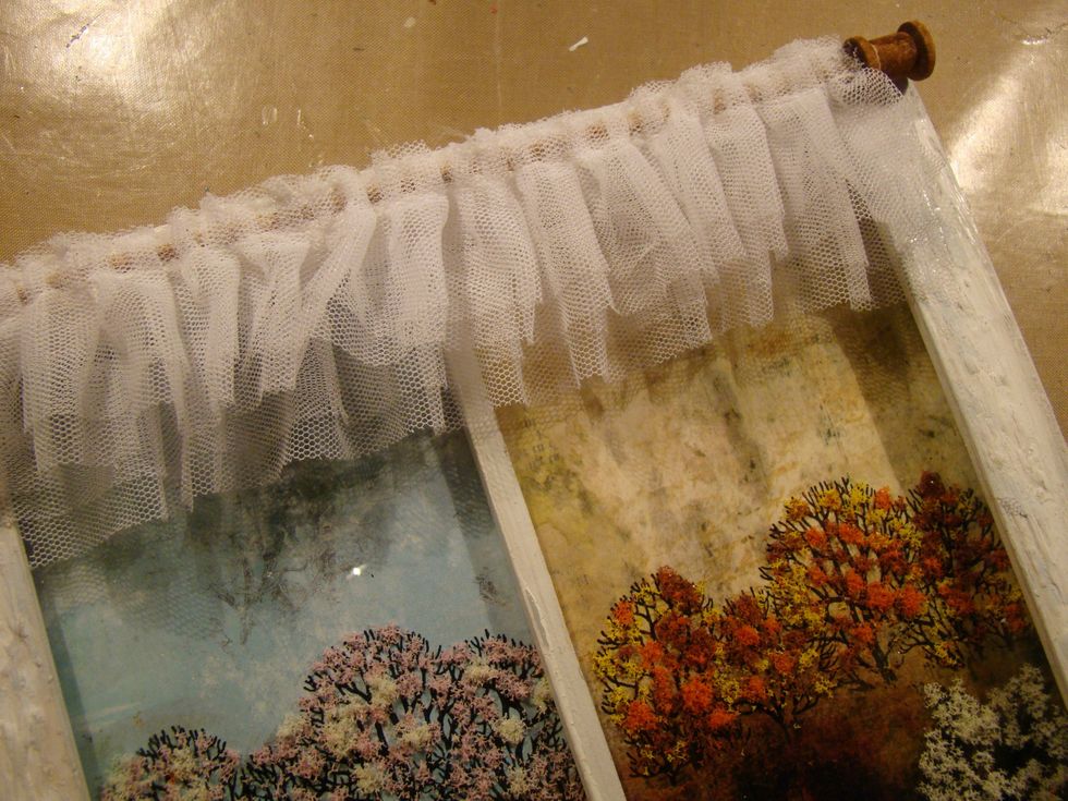 I used a double ruffled tulle for the curtains, but you can use lace or whatever you would like. Glue two rows down.