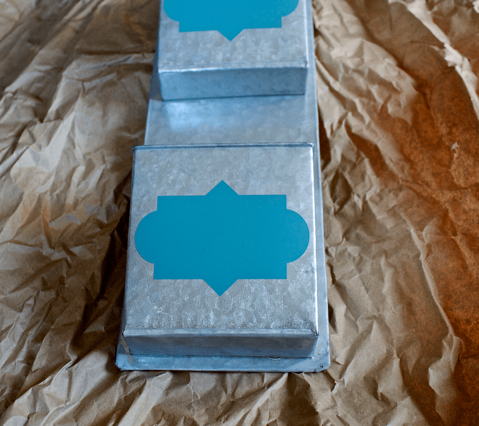 I used a free label cut file from Miss Katie's Cuttables, and cut them 3.5" x 5", then attached them to the front of each box.