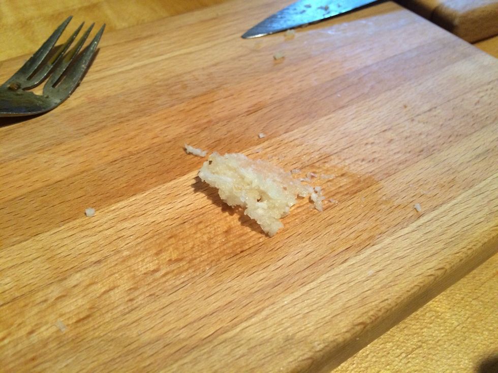 I used a fresh garlic and chopped it up fine. You can use powder if needed.