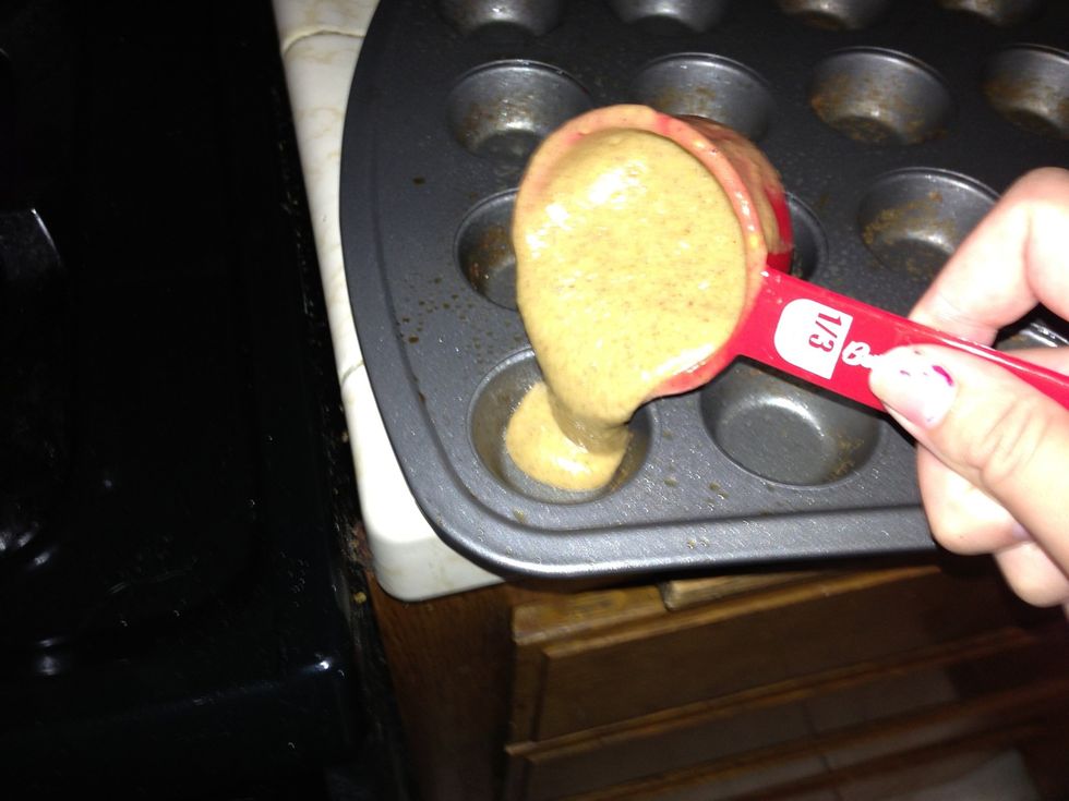 I used a measuring spoon to make it easier to spoon into tins! (Make sure not to fill too high, it'll take too long to cook them!)