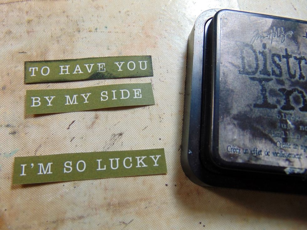 I used a Paper Brand strip from last months kit with this quote on the reverse side, cut it up and inked the edges with Distress Ink Black Soot.