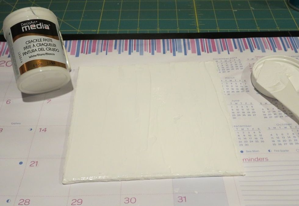 I used a plastic applicator tool to spread the crackle paste unevenly across the entire board.  Some places have a lot and some have very little.