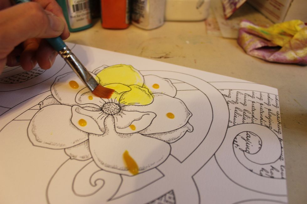 I used a Princeton brush to paint the flower.