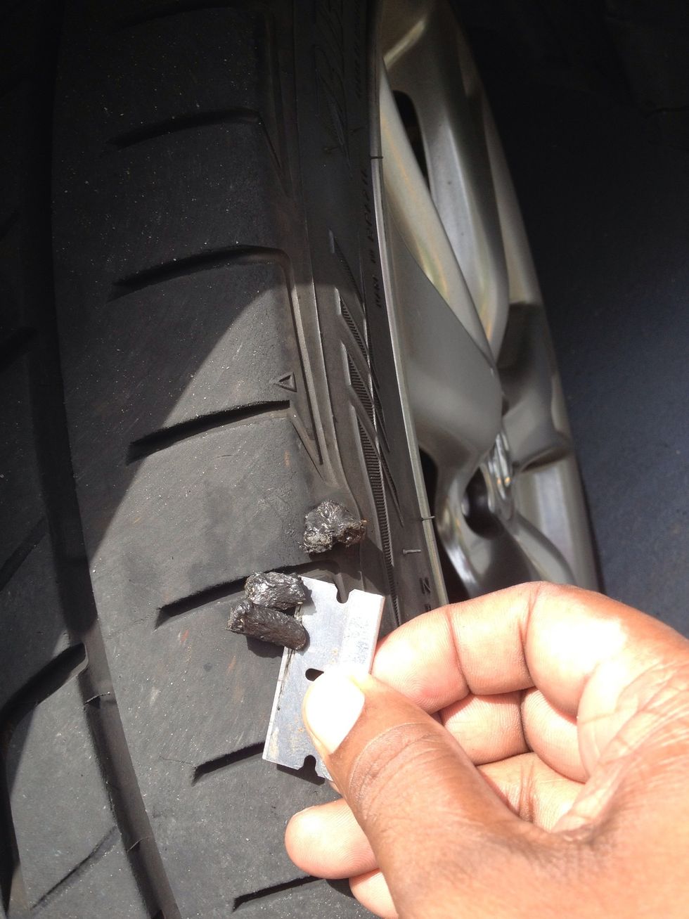 I used a razor blade to cut the excess off then filled it with air. Tire held pressure, and I'll just keep an eye on it.