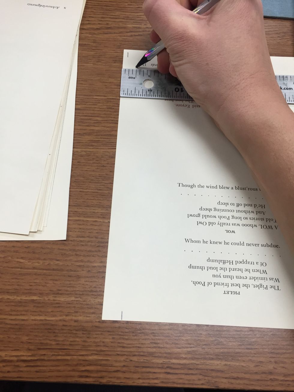 I used a ruler draw a line 1/2 of an inch from the edge of the paper.