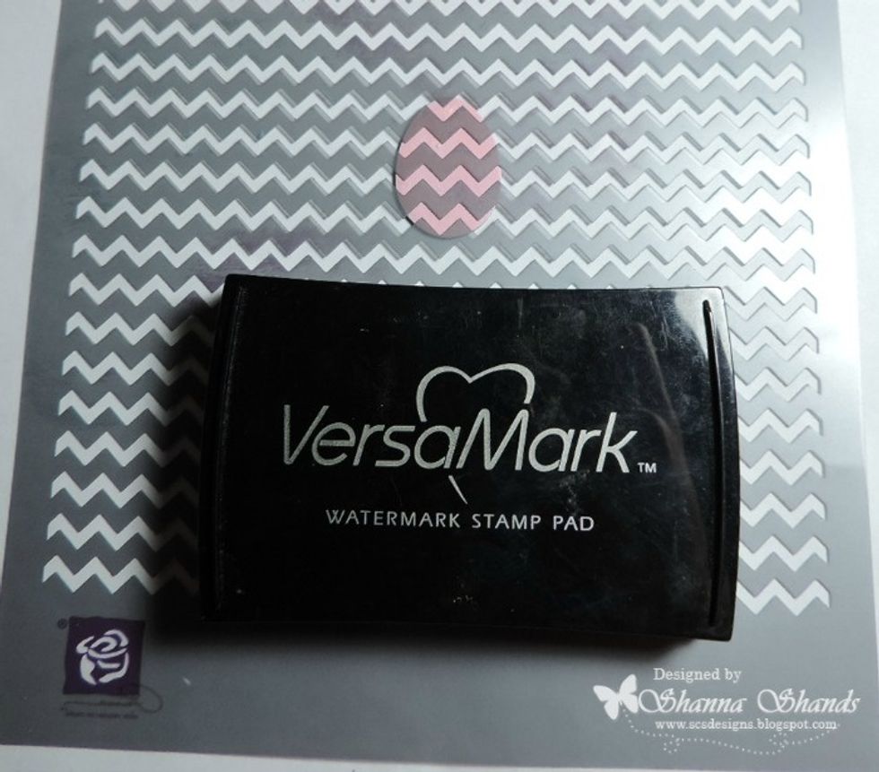 I used a stencil with VersaMark Watermark Ink to create a chevron design on the egg.