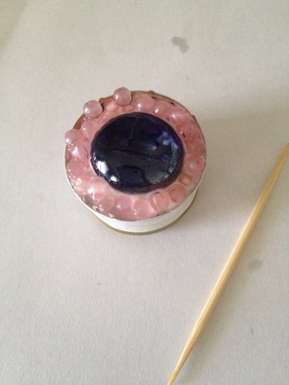 I used a toothpick to move the small beads where I wanted them without getting my fingers sticky! Wait for it to dry completely.