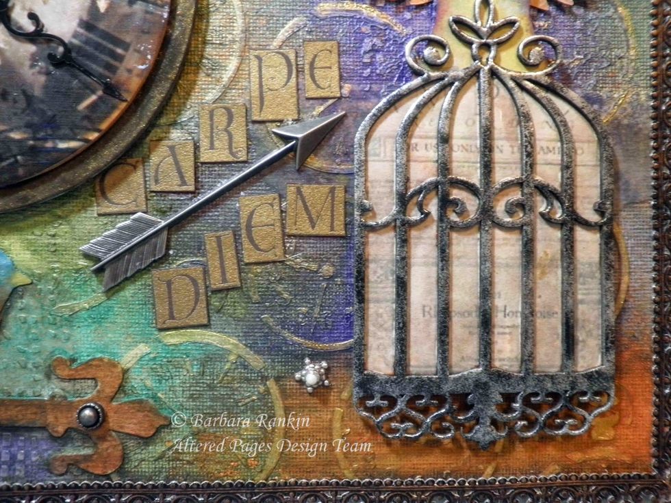 I used a wash of Pumice Stone distress stain over the paper beneath the bird cage and over the Time Flies letters to deepen the color and to get a better match with the whole canvas.