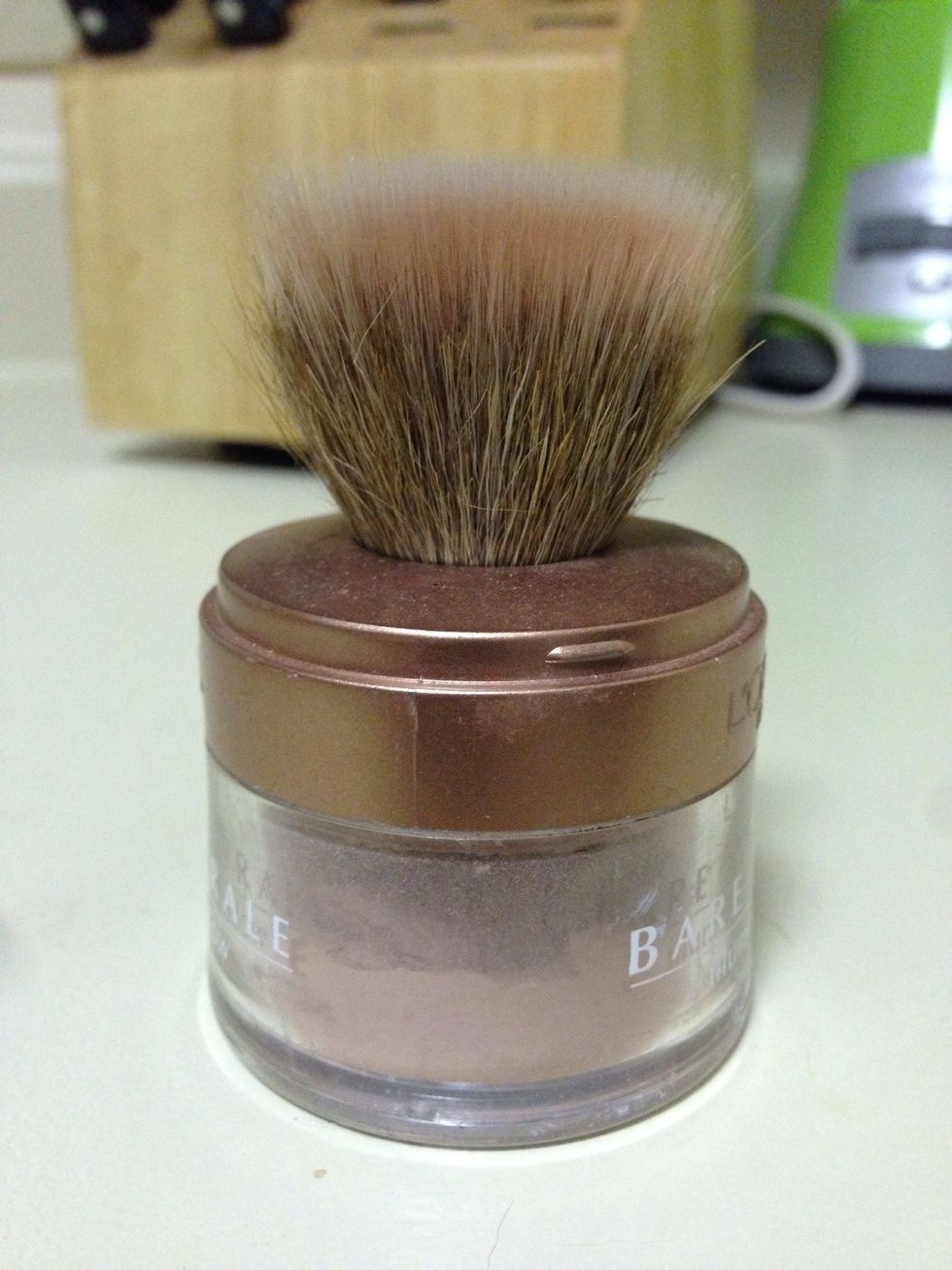 I used an old makeup blush container, and emptied it out