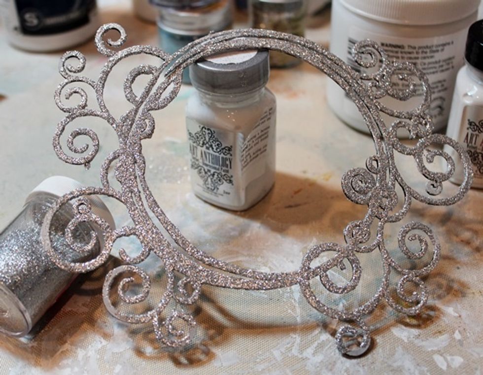 I used Art Anthology Sorbet- Splashed to adhere my glitter to this piece of chipboard.