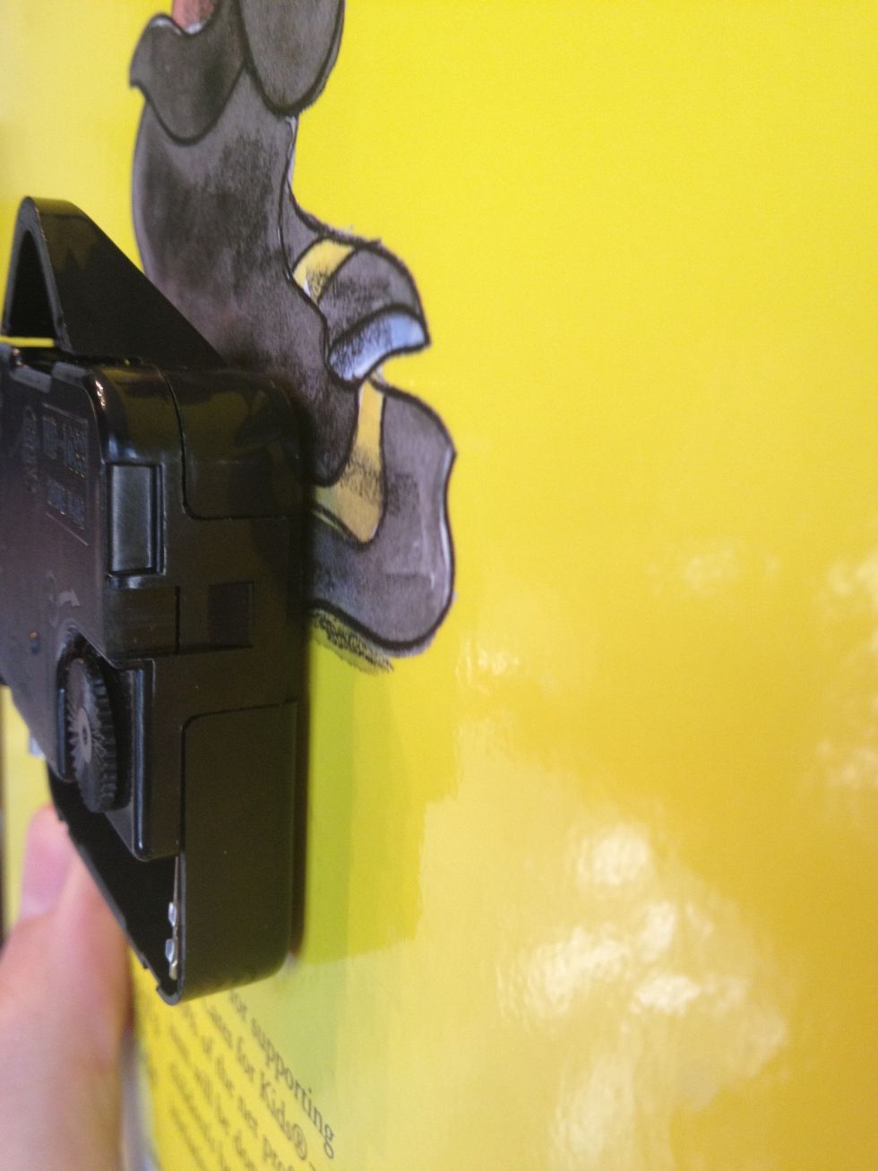 I used double sided tape and it sat flush with the back of the book.