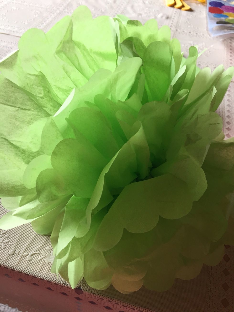 I used double stick tape to stick the Pom Pom to the top of the tube.