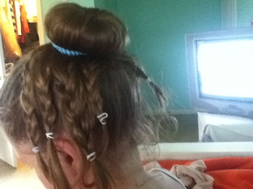I used loom bands to hold the braids