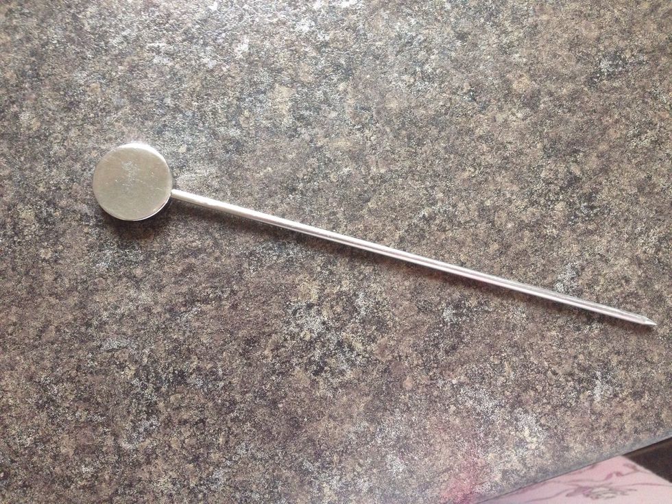 I used my cake tester, and it didn't come out clean (no cake mix stuck to it)